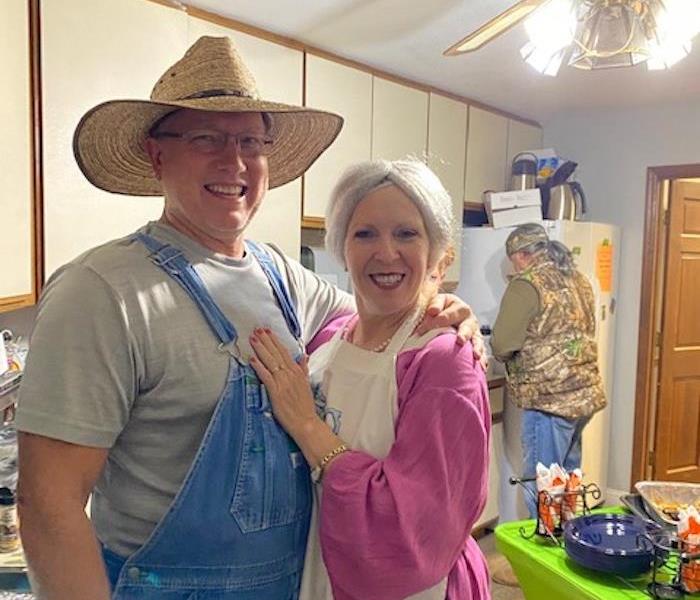 male and female dressed up as farmers