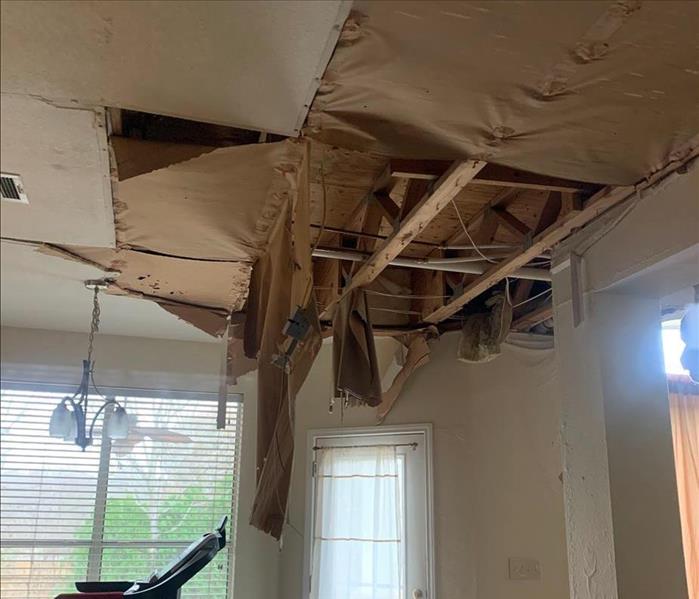 Kitchen with a collapsed ceiling