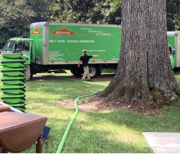 SERVPRO trailer and equipment being used at flooded property